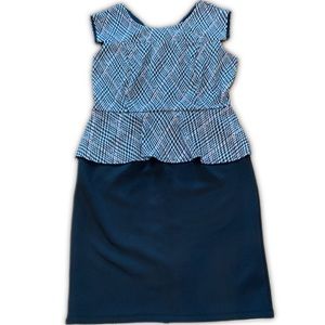 Enfocus Studio peplum style sleeveless dress with black skirt and plaid bodice